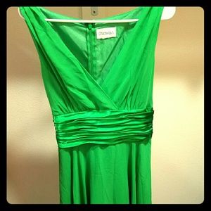Green Sleeveless Dress with versatile sash.