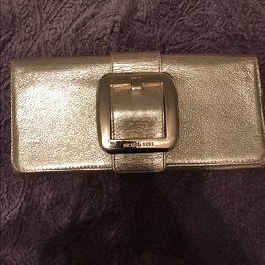 Michael Kors gold clutch