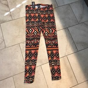 Eye candy aztec vibrant print leggings Medium NEW