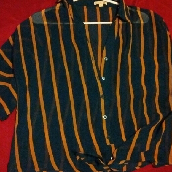 dark teal shirt with mustard yellow/gold stripes