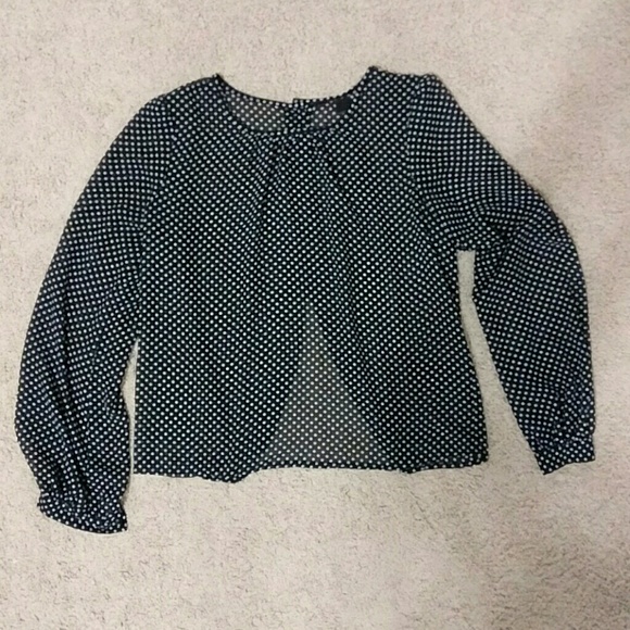 Polka dot blouse in black and white