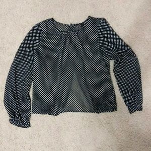 Polka dot blouse in black and white