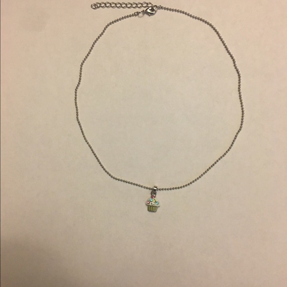 Costume necklace with pendant.