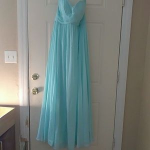 A mint strapless prom dress
