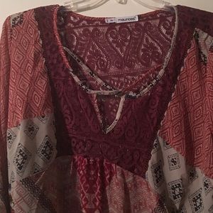 Tunic style shirt from Maurice's. Only worn once.