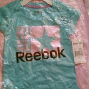 Girls 2T also fits 6-12 months brand new