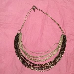 Lovely bronze/black/white/gold multichain necklace