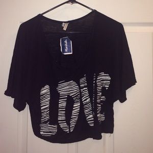🆕📍Black crop top w/ zebra print "LOVE"