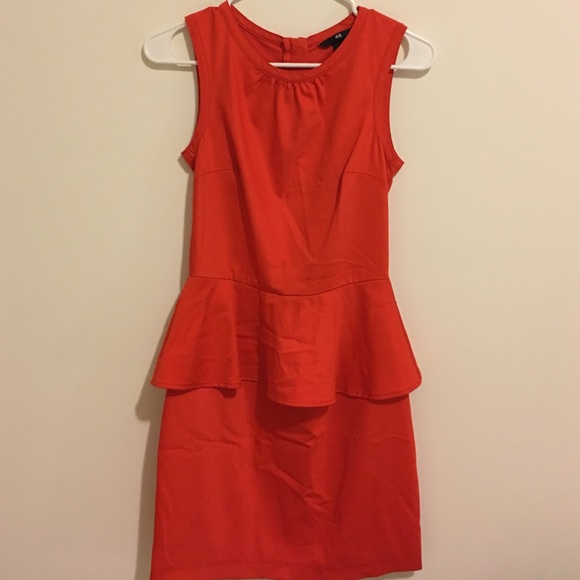 Red Form fitting peplum dress.