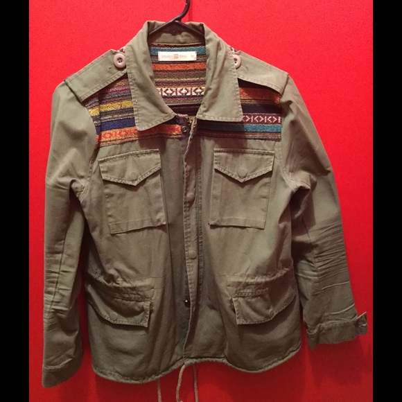 Green jacket with multi colored pattern