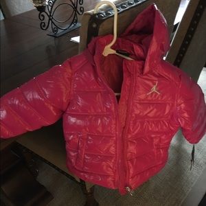 Girl pink and red puffer Jordan jumper