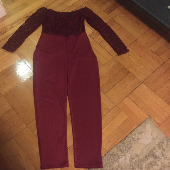 Wine colored jump suit with lace.