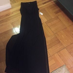 Jumpsuit with v neck bodysuit sheer maxi skirt.