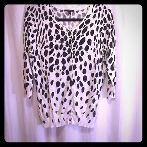 Black and white spotted sweater with rhinestones