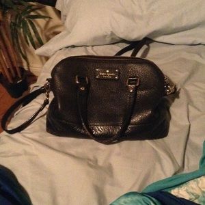 Beautiful gold and black Kate spade purse