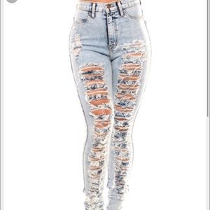 High waisted distressed acid wash jeans