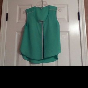 Lime Green sleeveless shirt with open back.