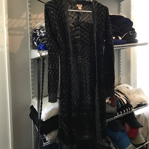 Long, black and white sweater