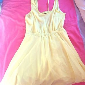 Cute yellow sun dress with cut out back