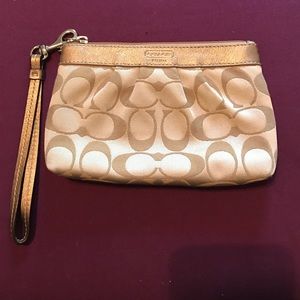 Coach  gold wristlet