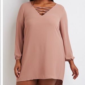 Blush colored shift dress with straps across front