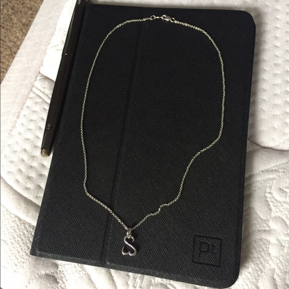 Jane Seymour open heart necklace.