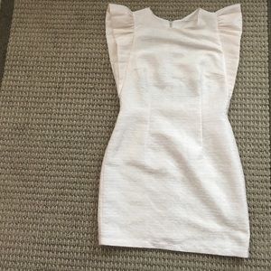 Light colored flare shoulder dress