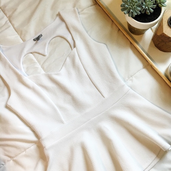 Heart cut-out peplum top