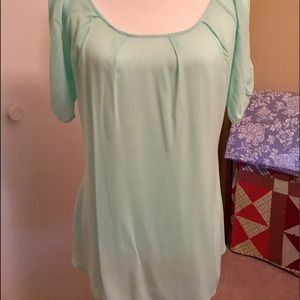 Mint green blouse with bow in the back
