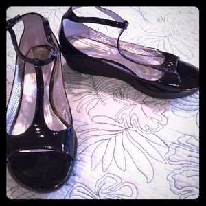 Kenneth Cole patent leather T Strap platforms.