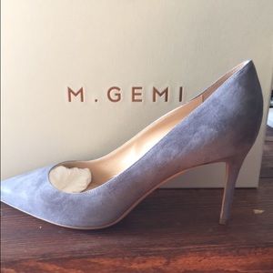 Brand new grey suede heels. Never worn.