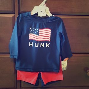 NWT 2 piece swim suite. Rash guard and shorts