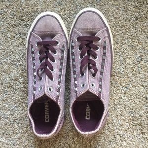 Purple studded converse