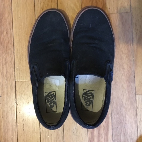 Vans black and gum slip ons