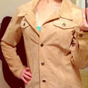 Tan suede jacket with silky gold lining.