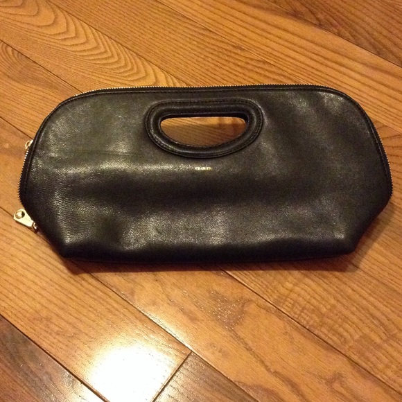 Urban Outfitters Handbags - NWOT Charuer zipper clutch with top handle