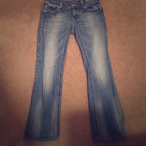 Light wash boot cut miss me jeans