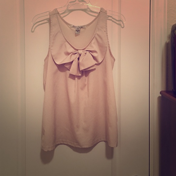 Cream blouse with bow