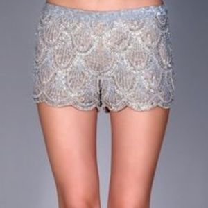 Silver scalloped sequined shorts. L