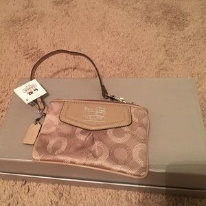 Beige coach wristlet