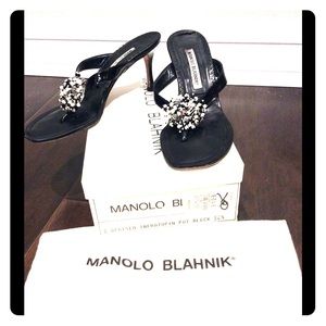 Manolo Blahnik black heels with seashell top.