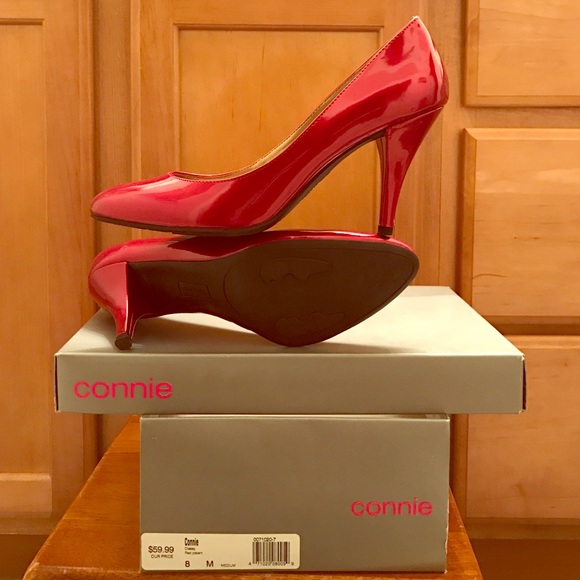 Classy red patent pump, size 8M.
