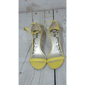Yellow strappy heels