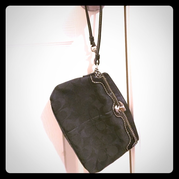 Authentic Coach wristlet.