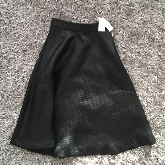 LAST CALL.  Black midi textured skirt.
