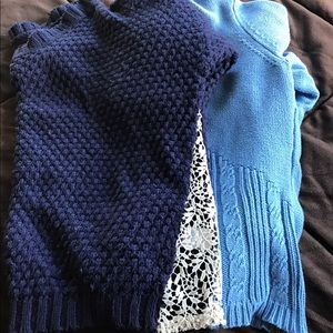 2 blue sweaters