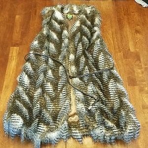 Long chic faux fur vest with braided belt
