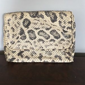 Snakeskin clutch