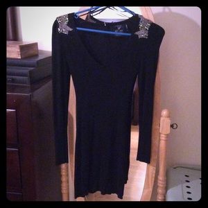 Black vneck sweater dress.