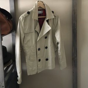 Water resistant tan peacoat.